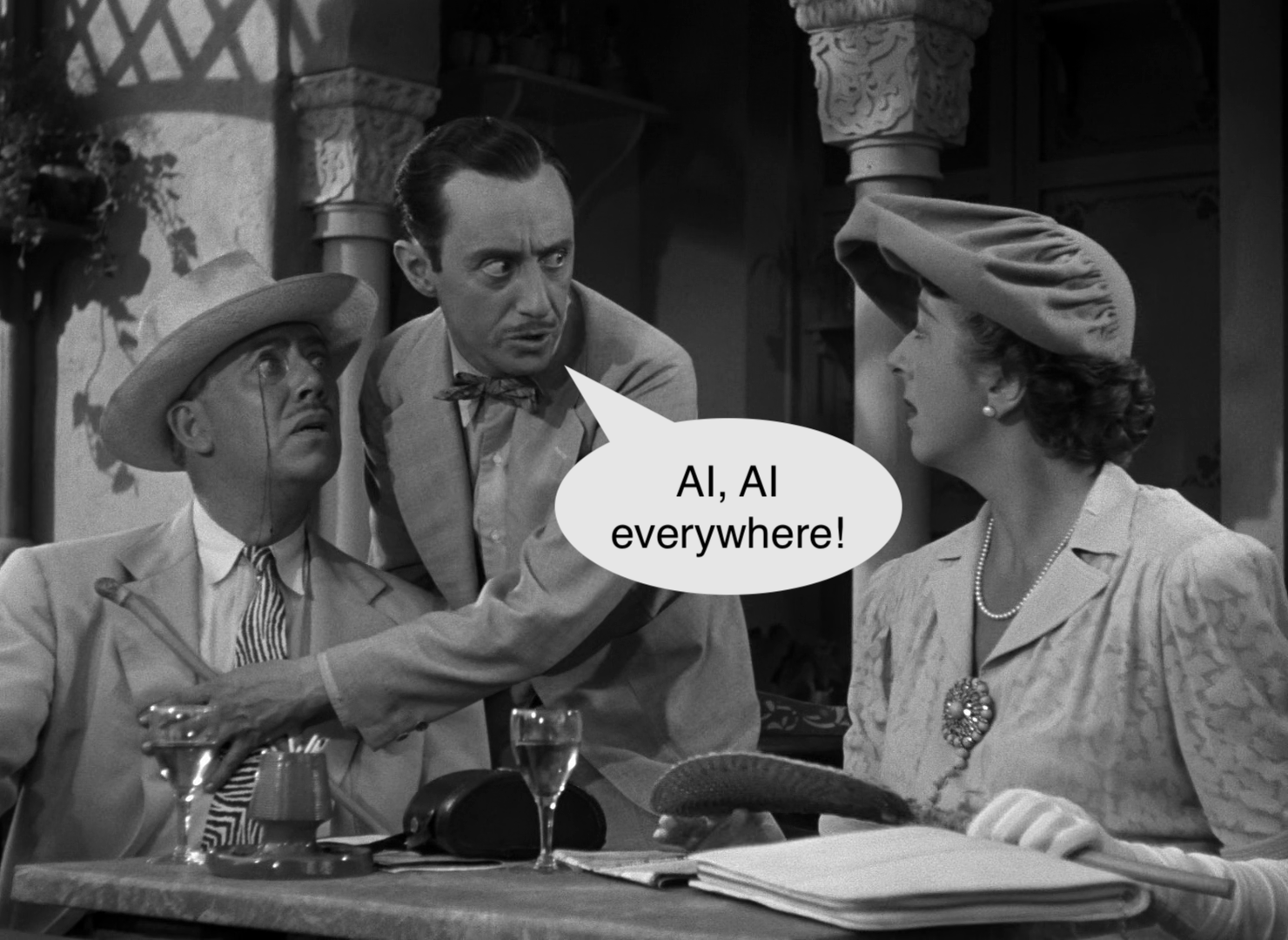 A scene from the movie Casablanca in which a pickpocket warns two restaurant patrons that "There are vultures, vultures everywhere," while pickpocketing one of them. In this image, however, the caption from the pickpocket's mouth reads, "AI, AI, everywhere!"